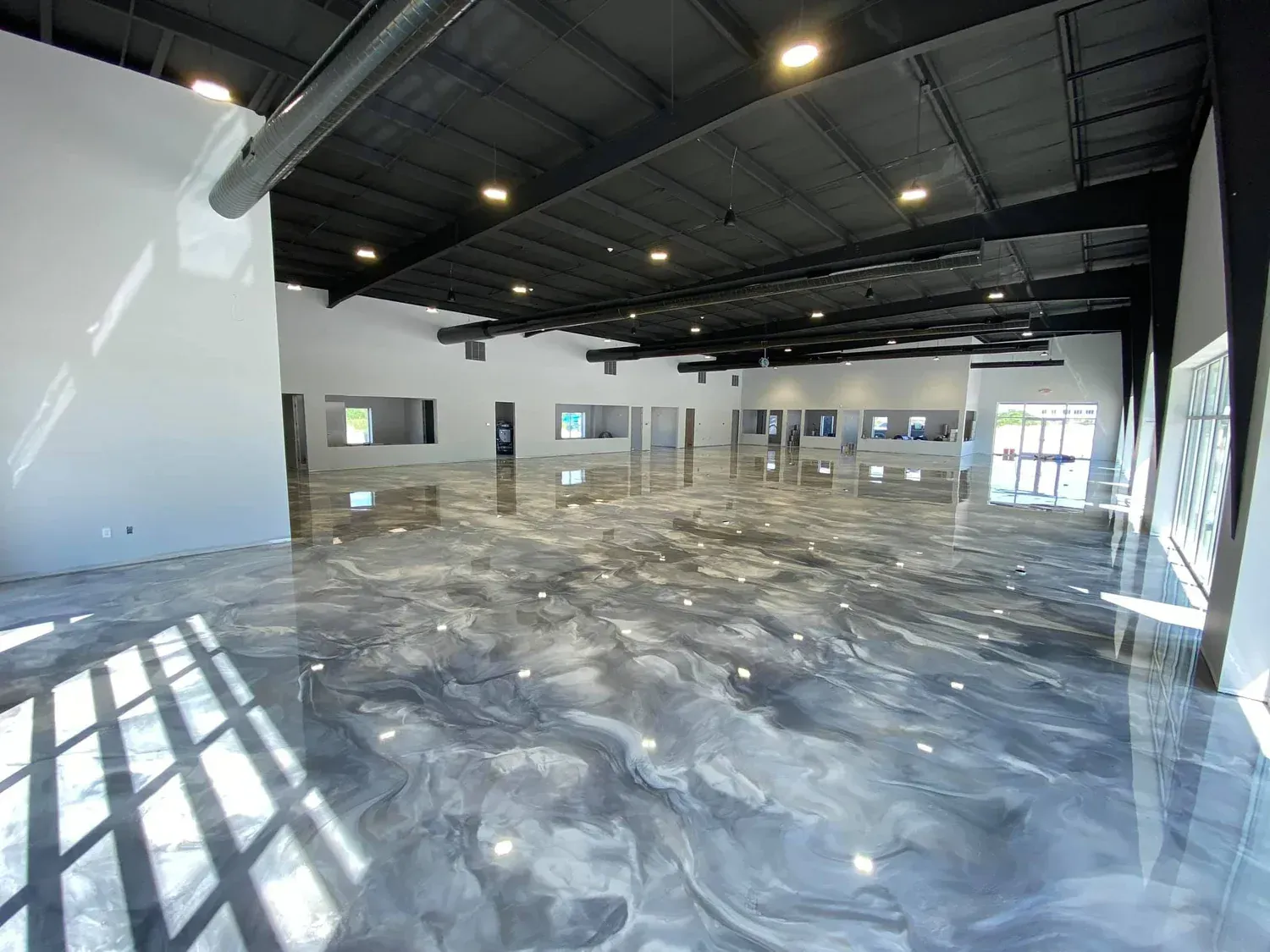Parking garage with epoxy flooring.