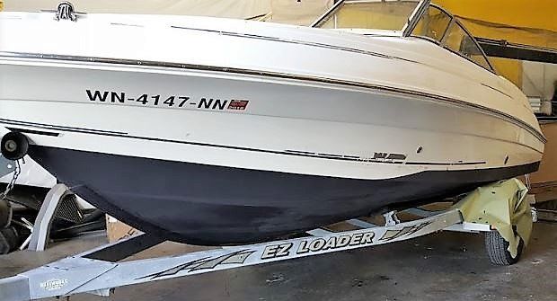 White boat on a trailer