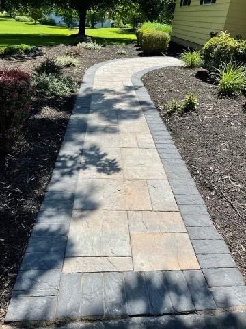 A beautiful walkway with stone pavers