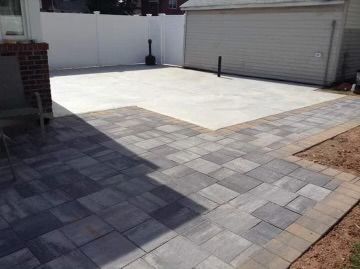 A cozy patio with brick pavers