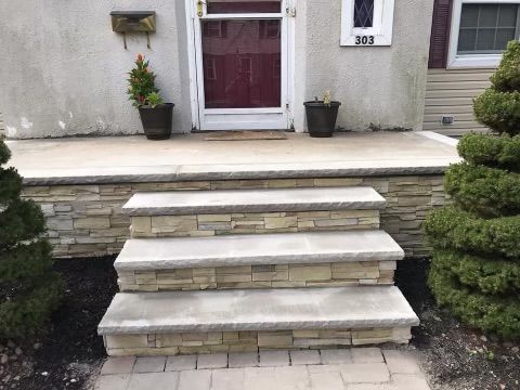 Stone steps leading to a front door