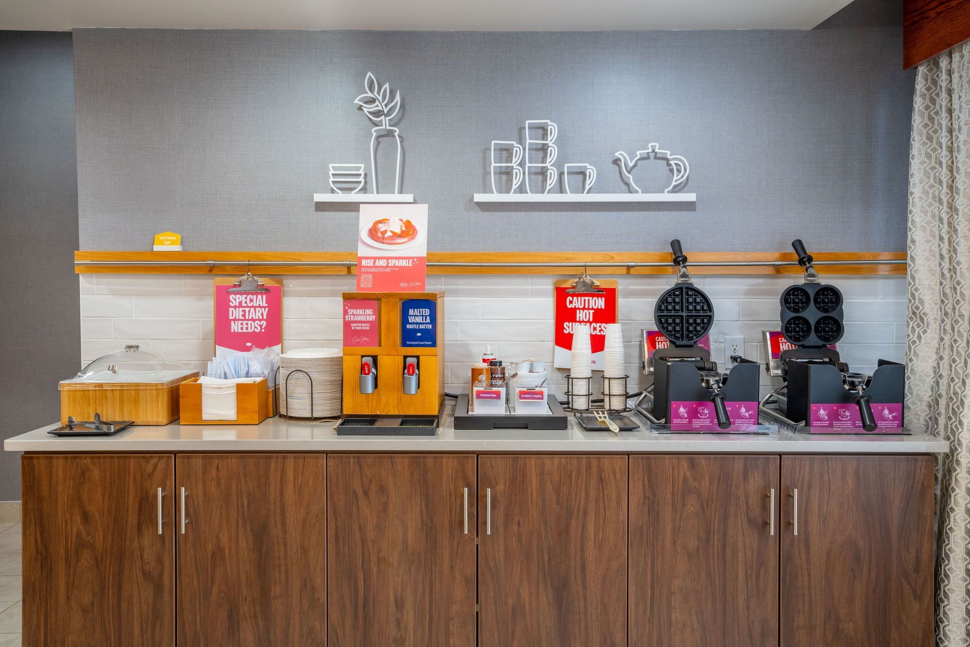A hotel buffet with a variety of food and drinks.