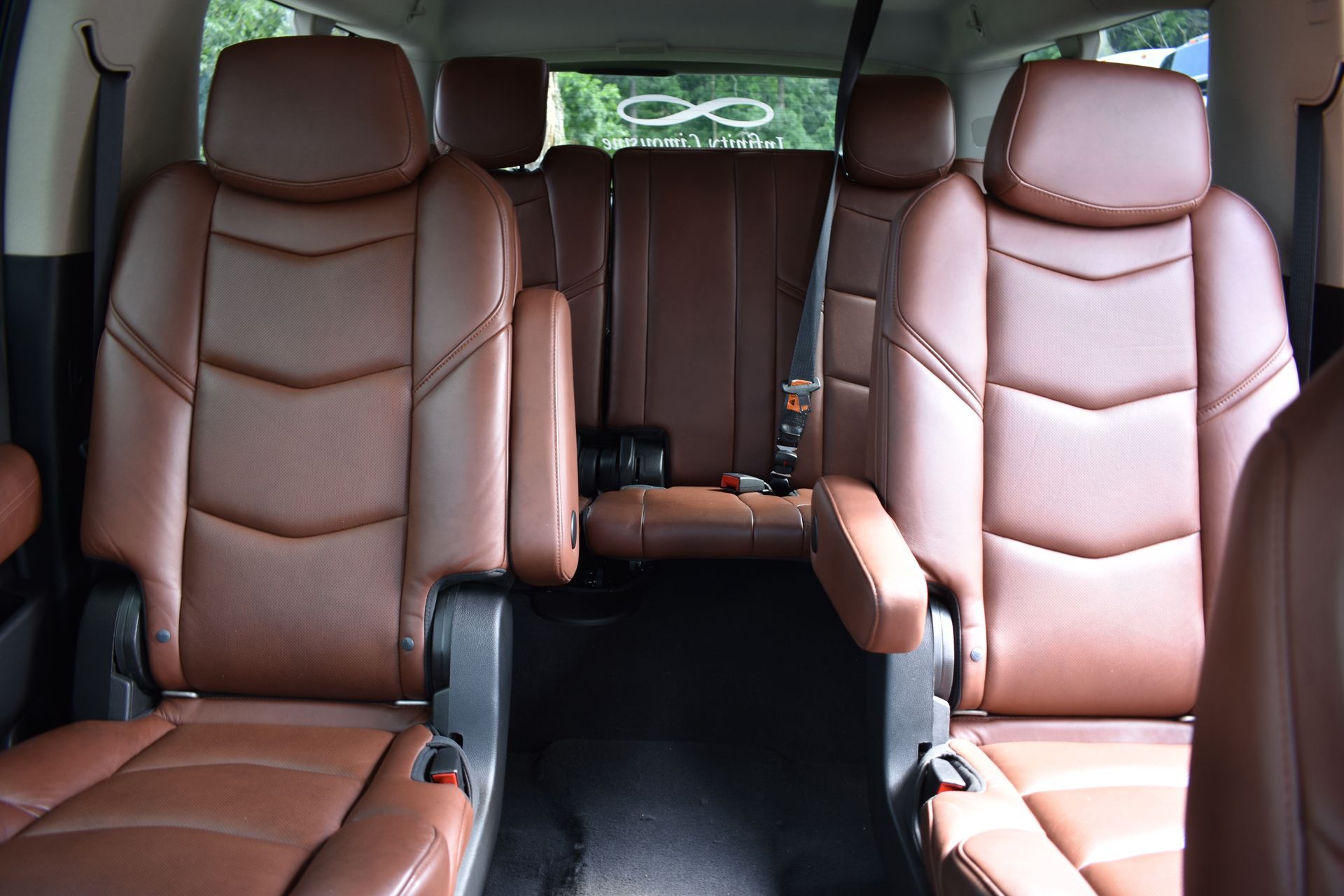 The interior of a car with brown leather seats