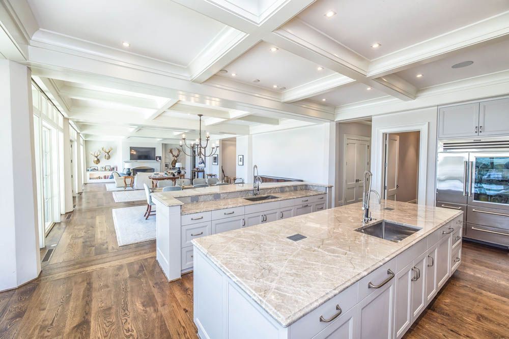 There is a large island in the middle of the kitchen.