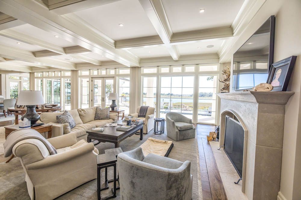 A living room filled with furniture and a fireplace.