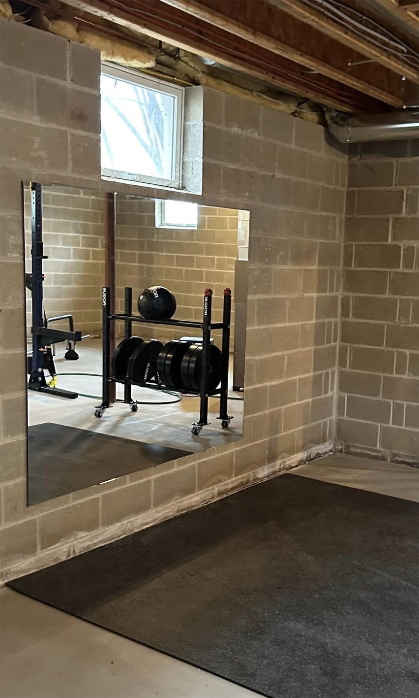 There is a large mirror in the middle of the room.