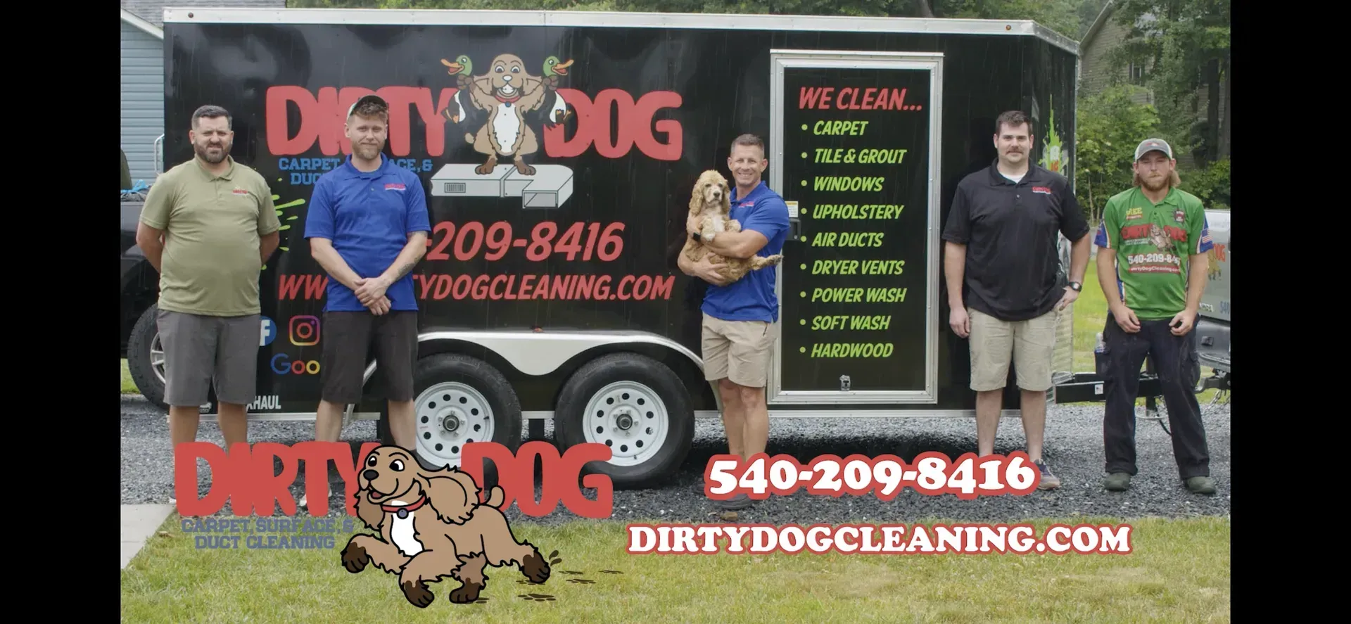 Group posing beside Dirty Dog Cleaning trailer with dog logo and contact info