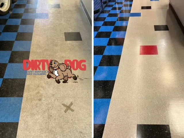 Indoor hallway with black-and-blue floor tiles and red floor markers, overlaid with a cartoon “DIRT BUG” graphic.