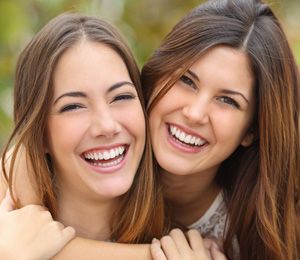 Two women smiling