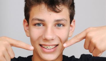teenage boy with braces