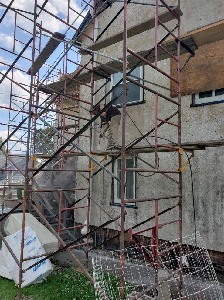 A building with scaffolding on the side of it