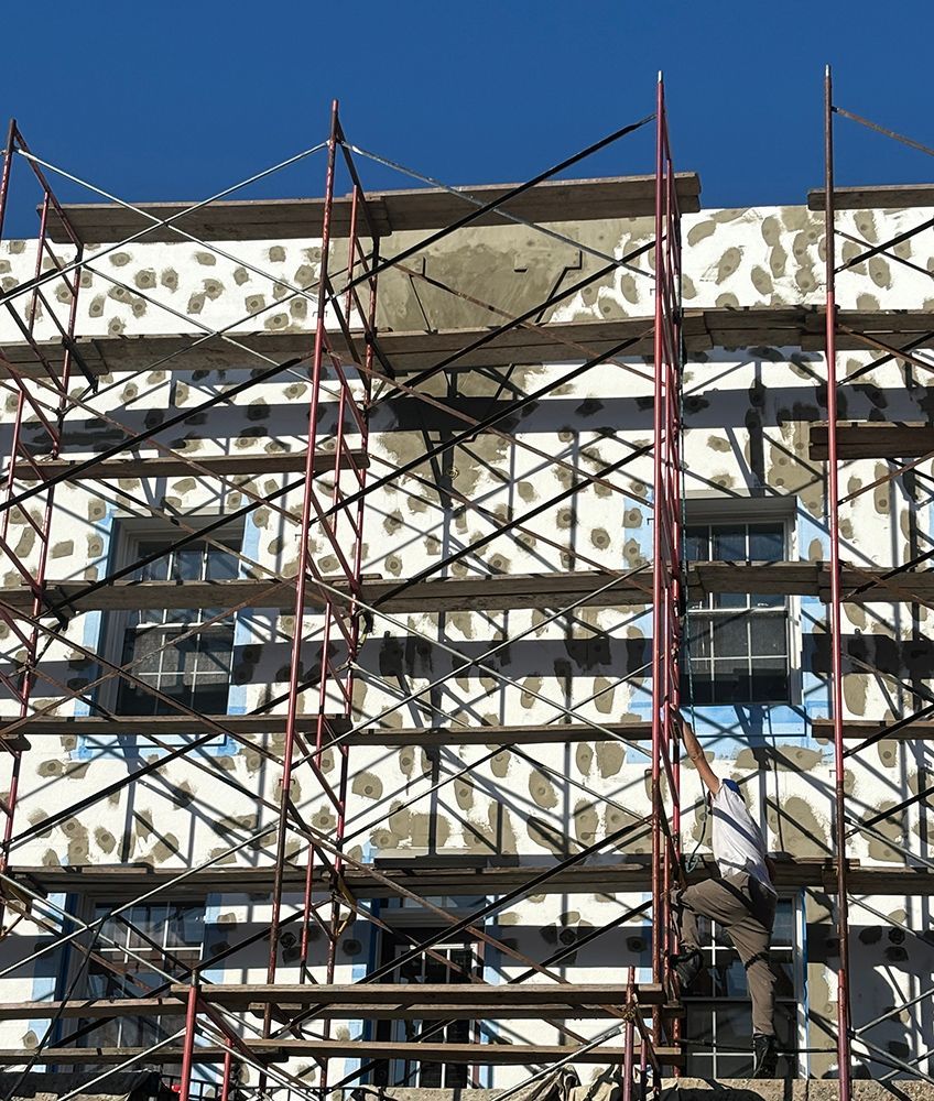 A large building with scaffolding on the side of it