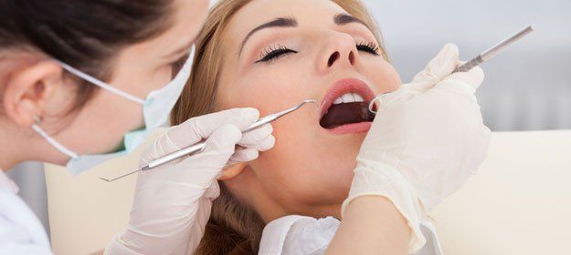 High angle view of a woman having her dental checkup