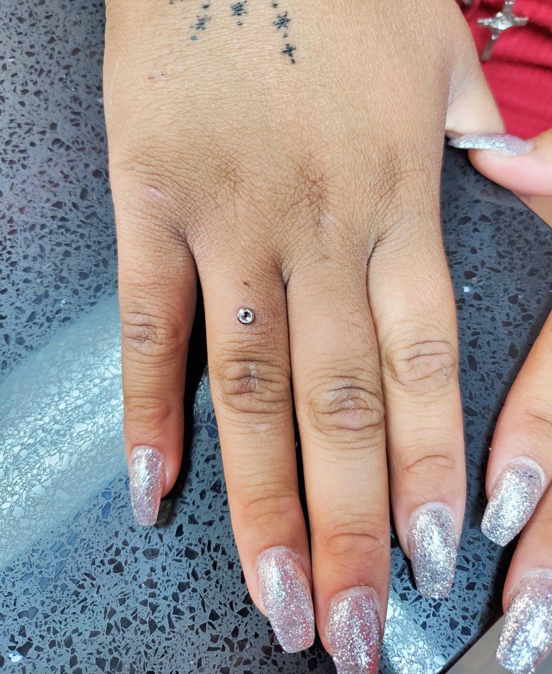 Hand piercing
