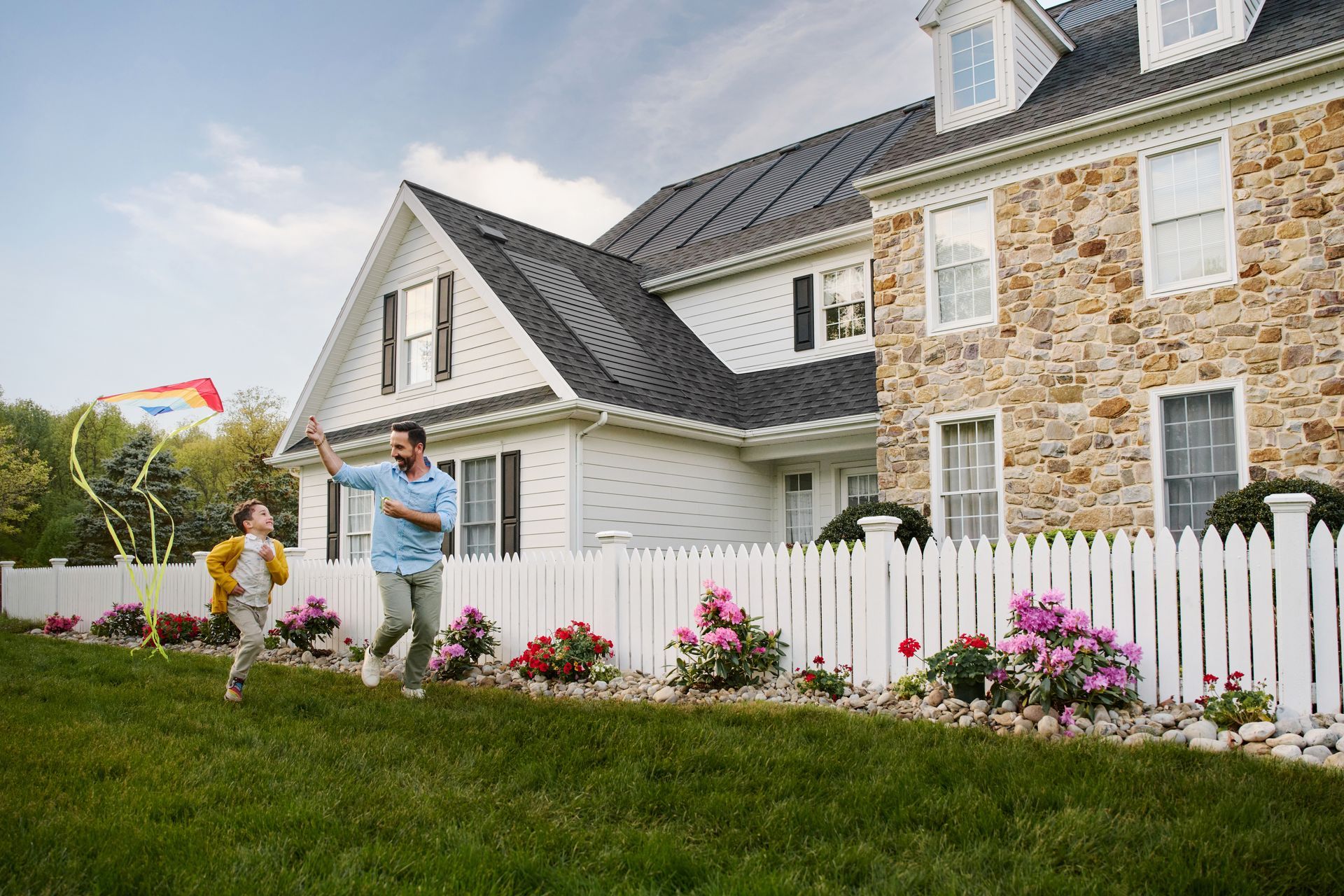 house with solar panels being added
