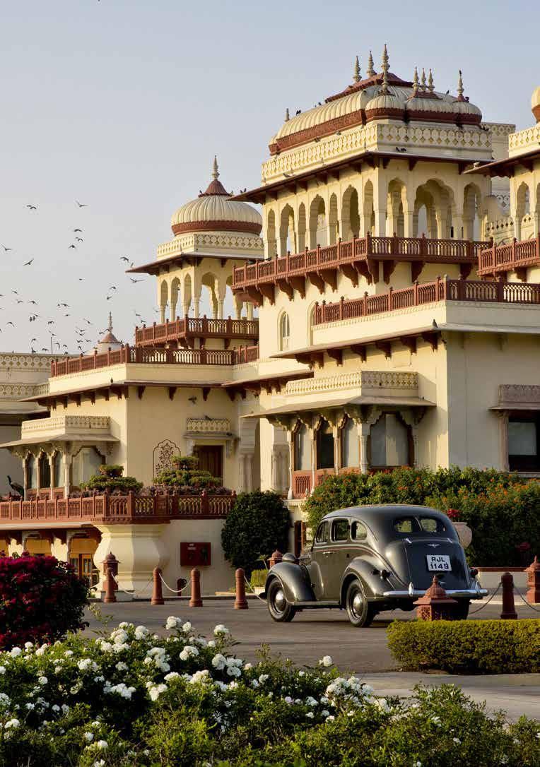A large building with a car parked in front of it