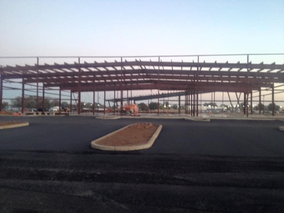 View of outside of steel framing from parking area