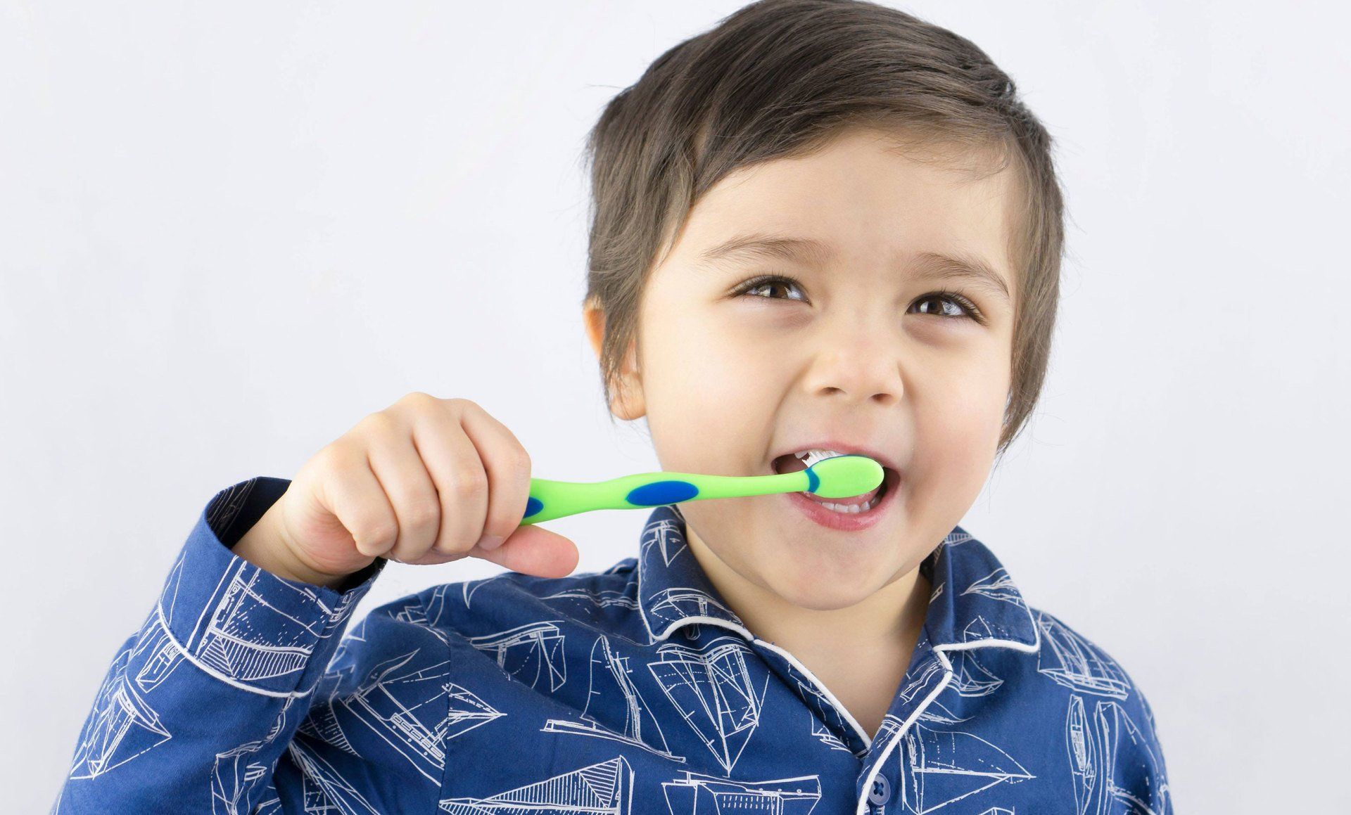 boy brushing his teeth