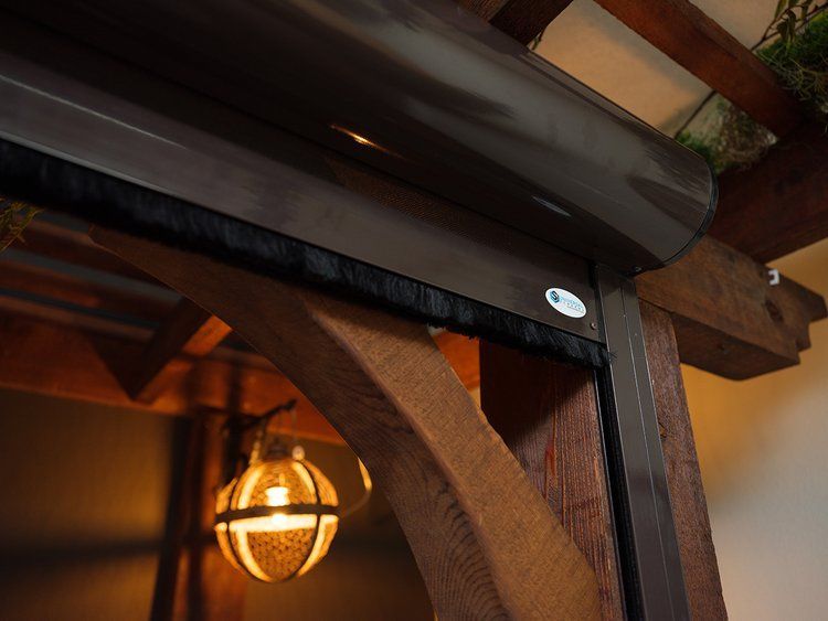 A wooden structure with a light hanging from it