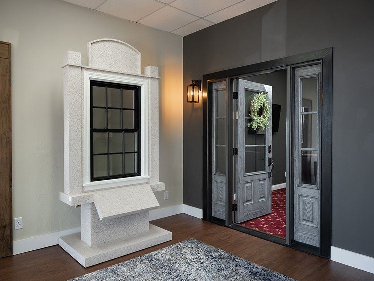 A room with a window and a door in it.