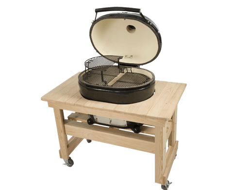 A grill is sitting on top of a wooden table.