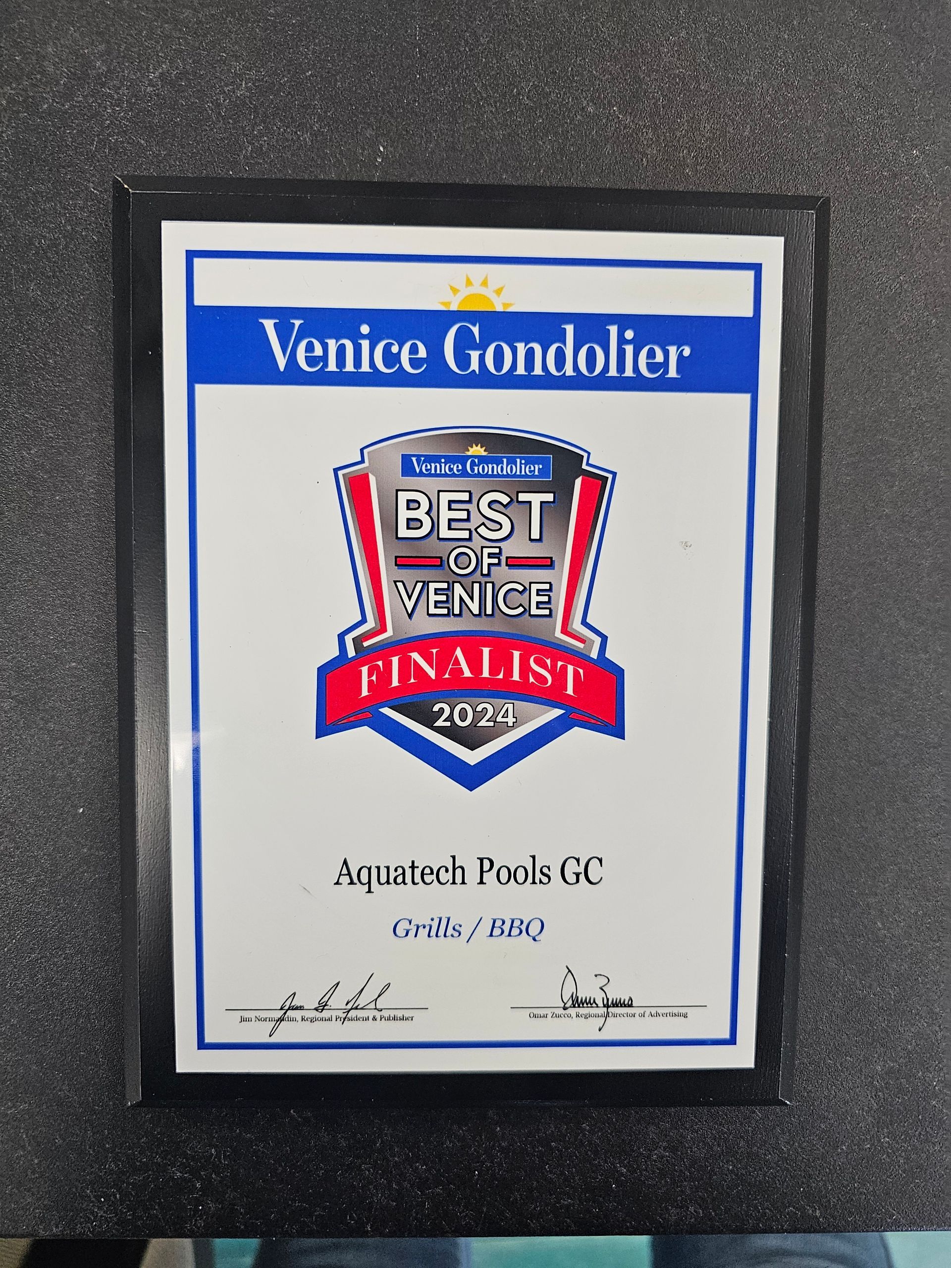 A framed certificate that says venice gondolier best of venice finalist