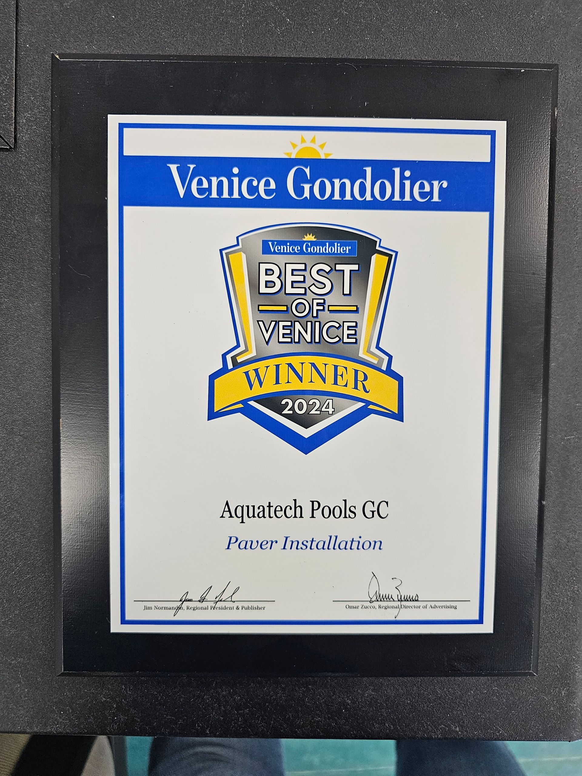 A framed certificate that says venice gondolier best of venice winner