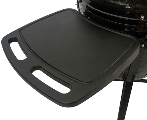 A black grill with a black cutting board attached to it