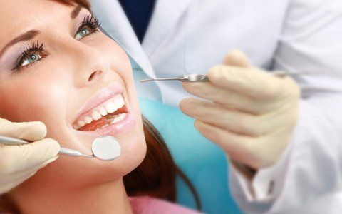 Woman for dental inspection