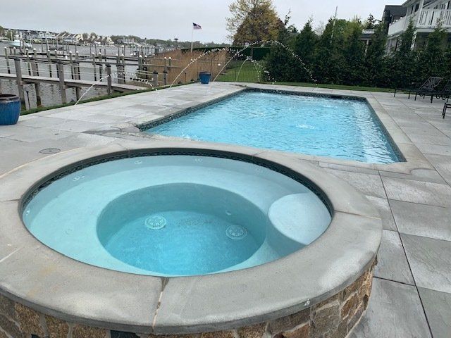 Swimming pool with jacuzzi