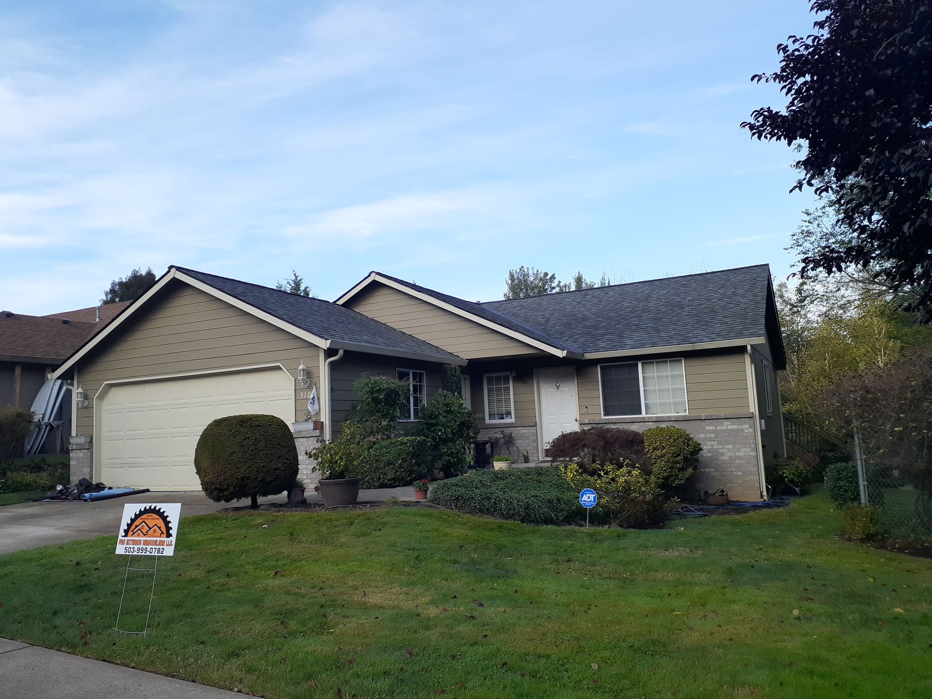 A house with a sign in front of it that says ' i love you '