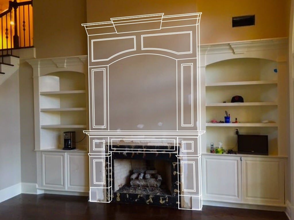 Living room wall with a fireplace and built-in white cabinets and shelves on both sides