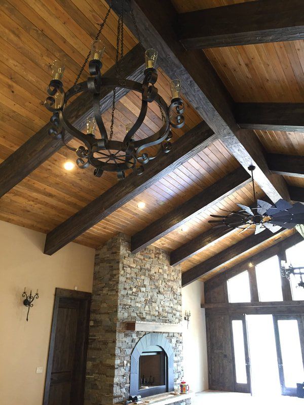 Custom Rustic Alder Beams, Distressed to Compliment the Doors