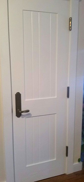 Painted Hemlock Door With Wide Stiles and Heavy Hardware