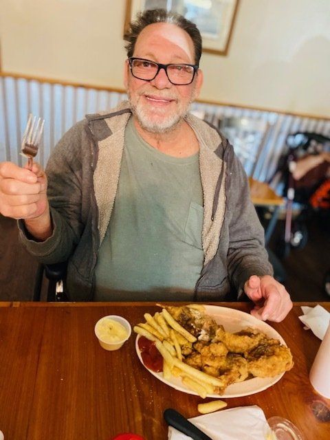 adult man eating food