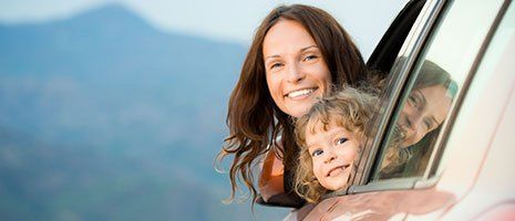 a mother and child in a car