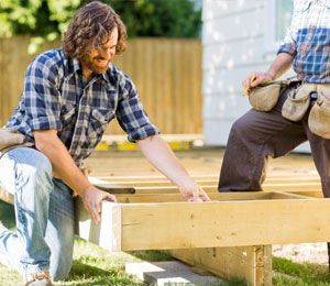 men building a deck