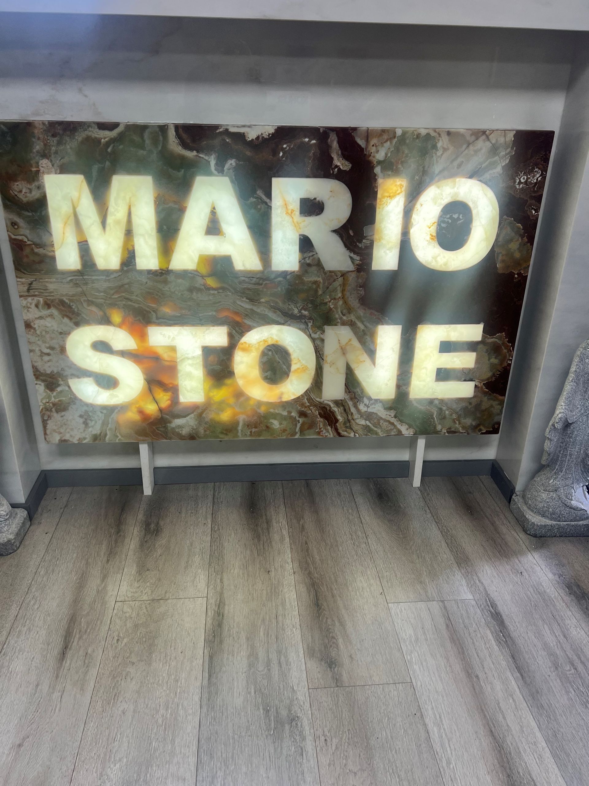 A sign that says mario stone on it