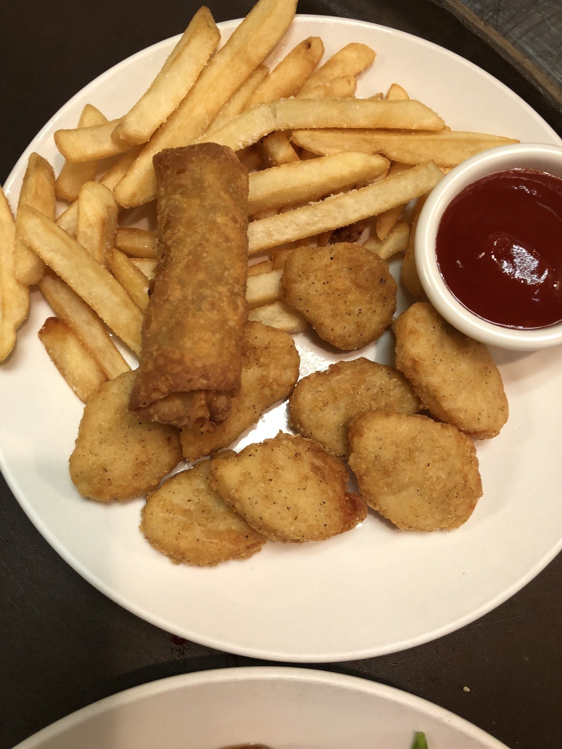 Fries, spring roll and chicken nuggets