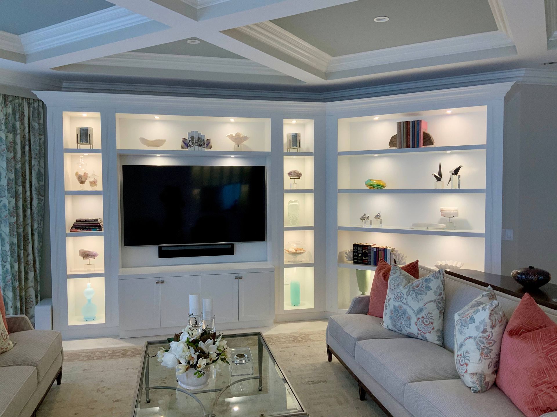 A living room with a couch and a flat screen tv