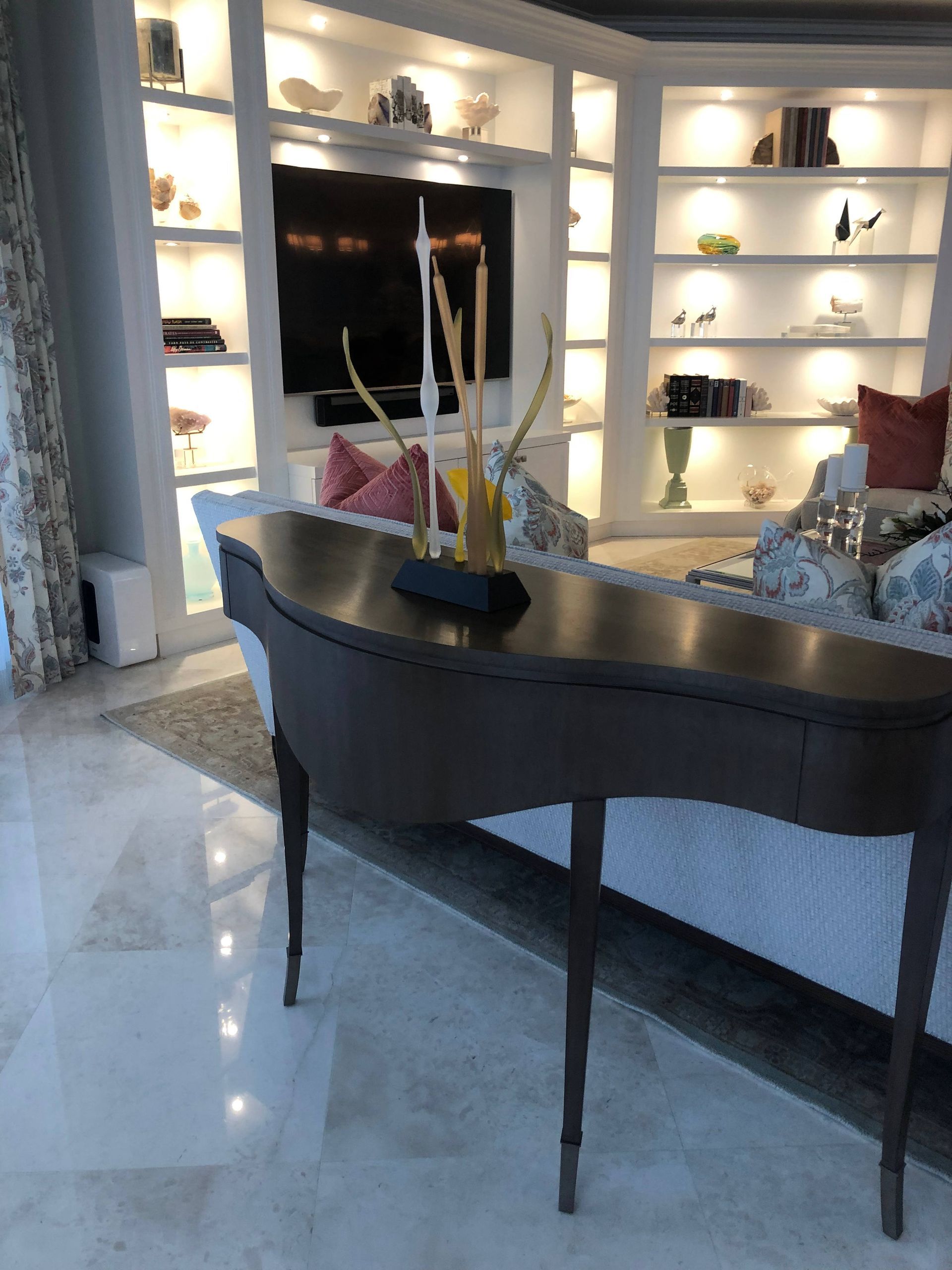 A living room with a piano and a couch