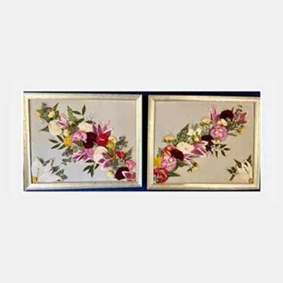Two square framed floral arrangements, one left, one right, on a light blue background.