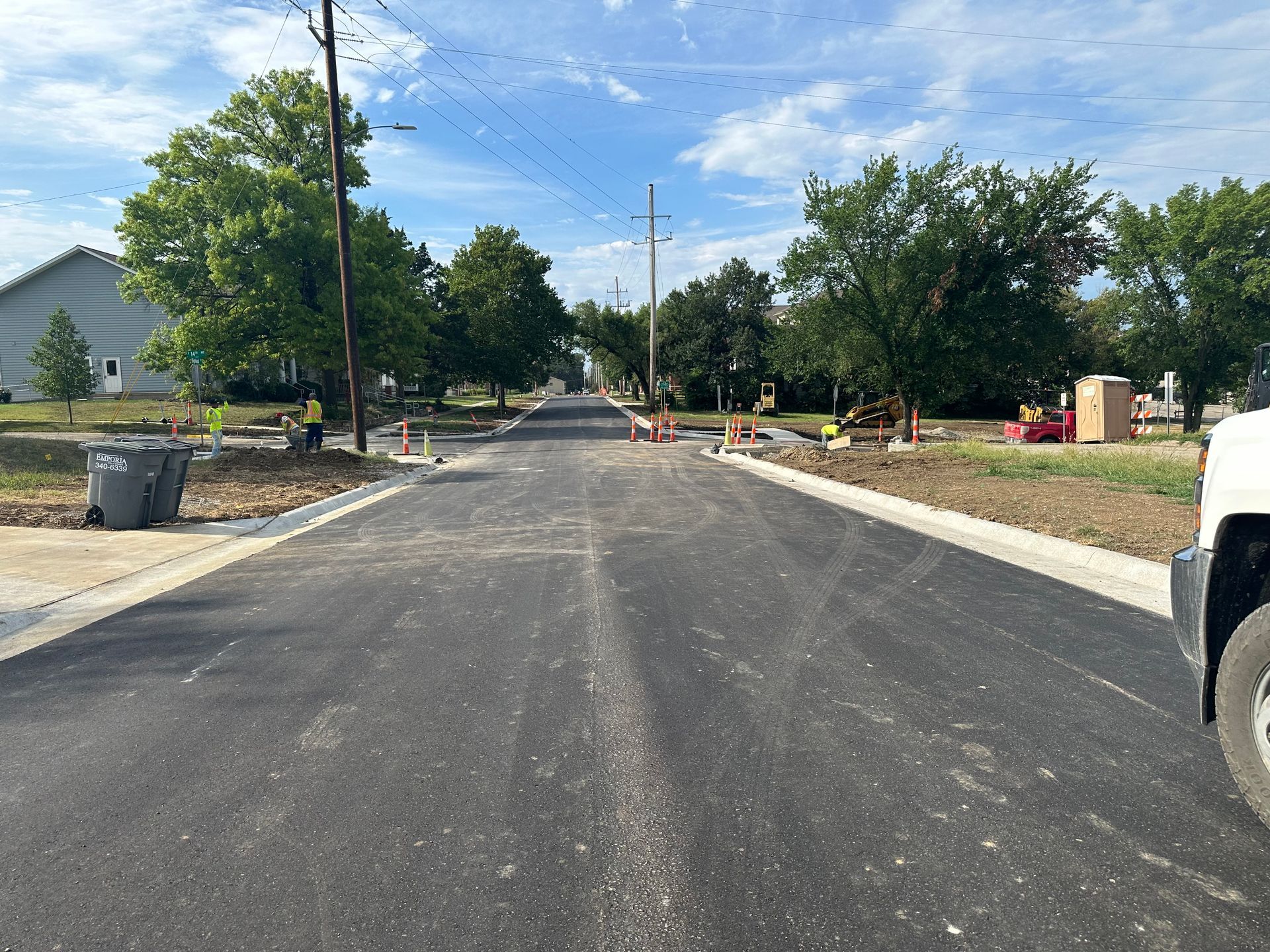a truck is parked on the side of a road
