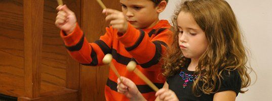 Kids playing musical instruments