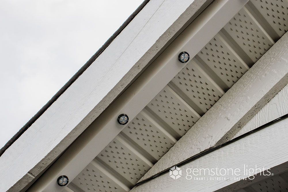 A close up of a roof with the words gemstone lights on the bottom