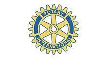 Rotary International logo: yellow gear with blue text 