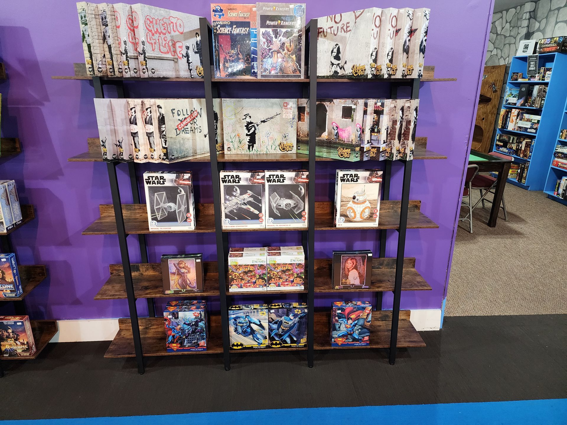 Shelf with a lot of star wars board games on it