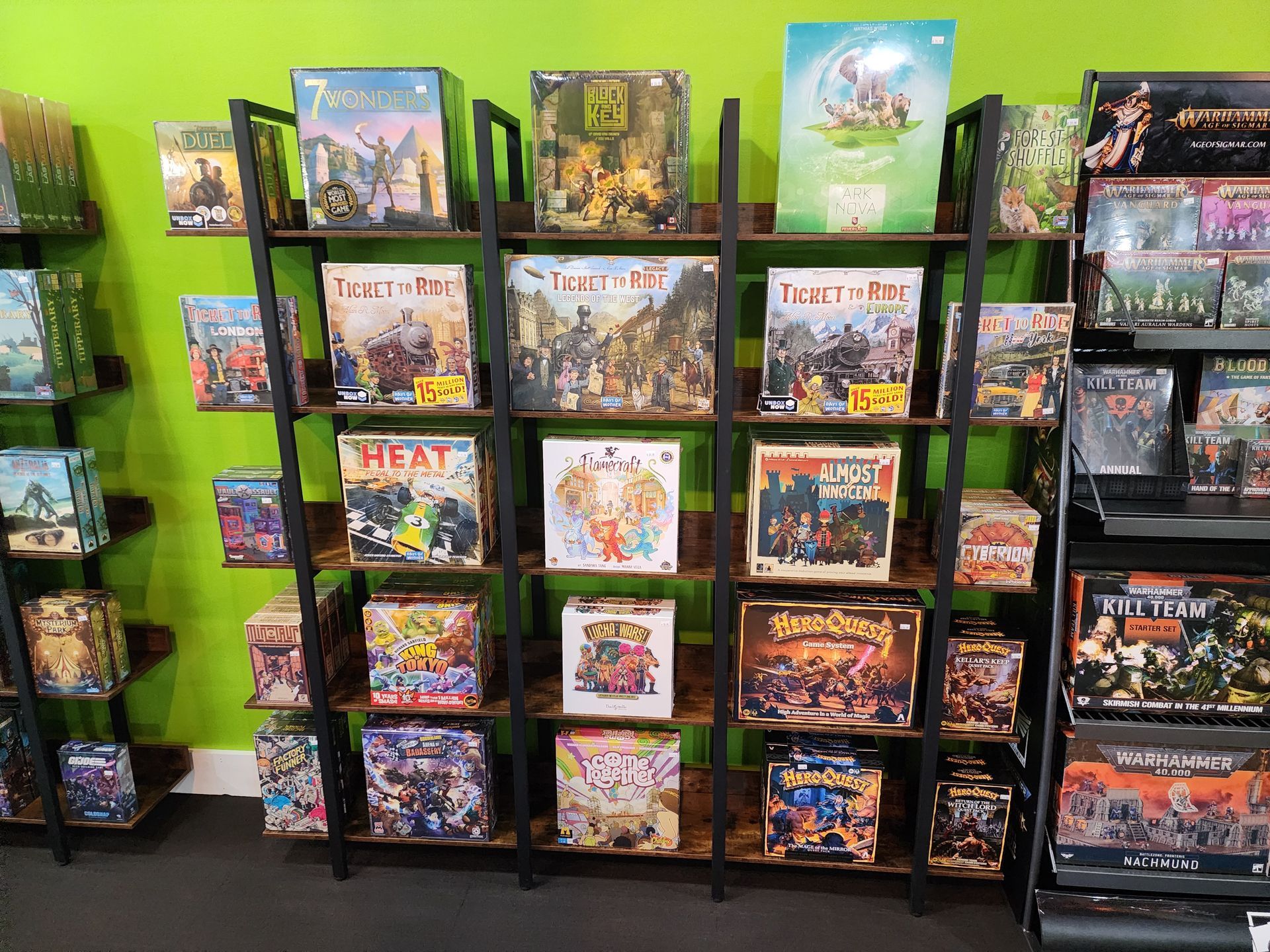A display of board games on shelves in a store