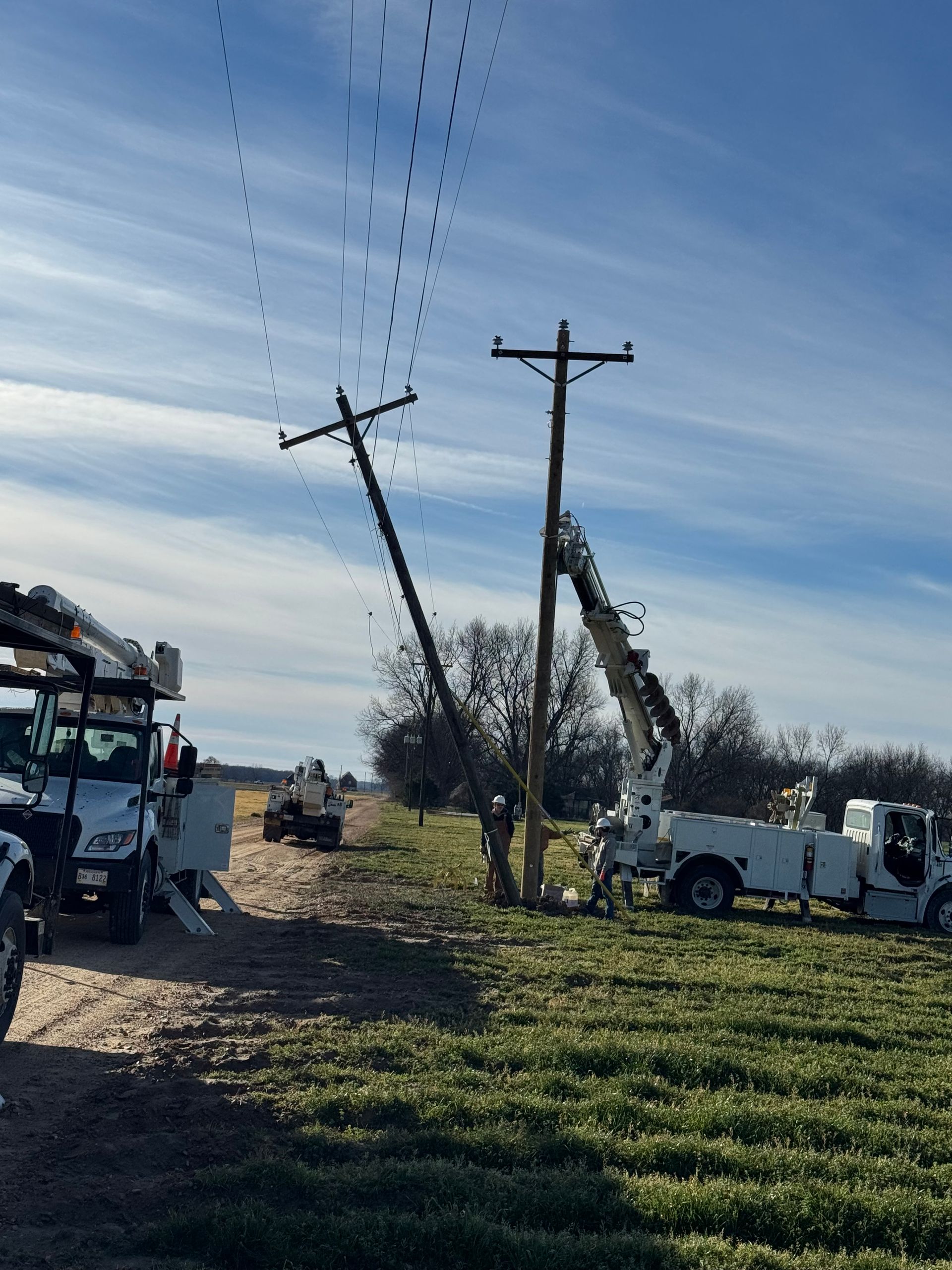 A telephone pole being replaced