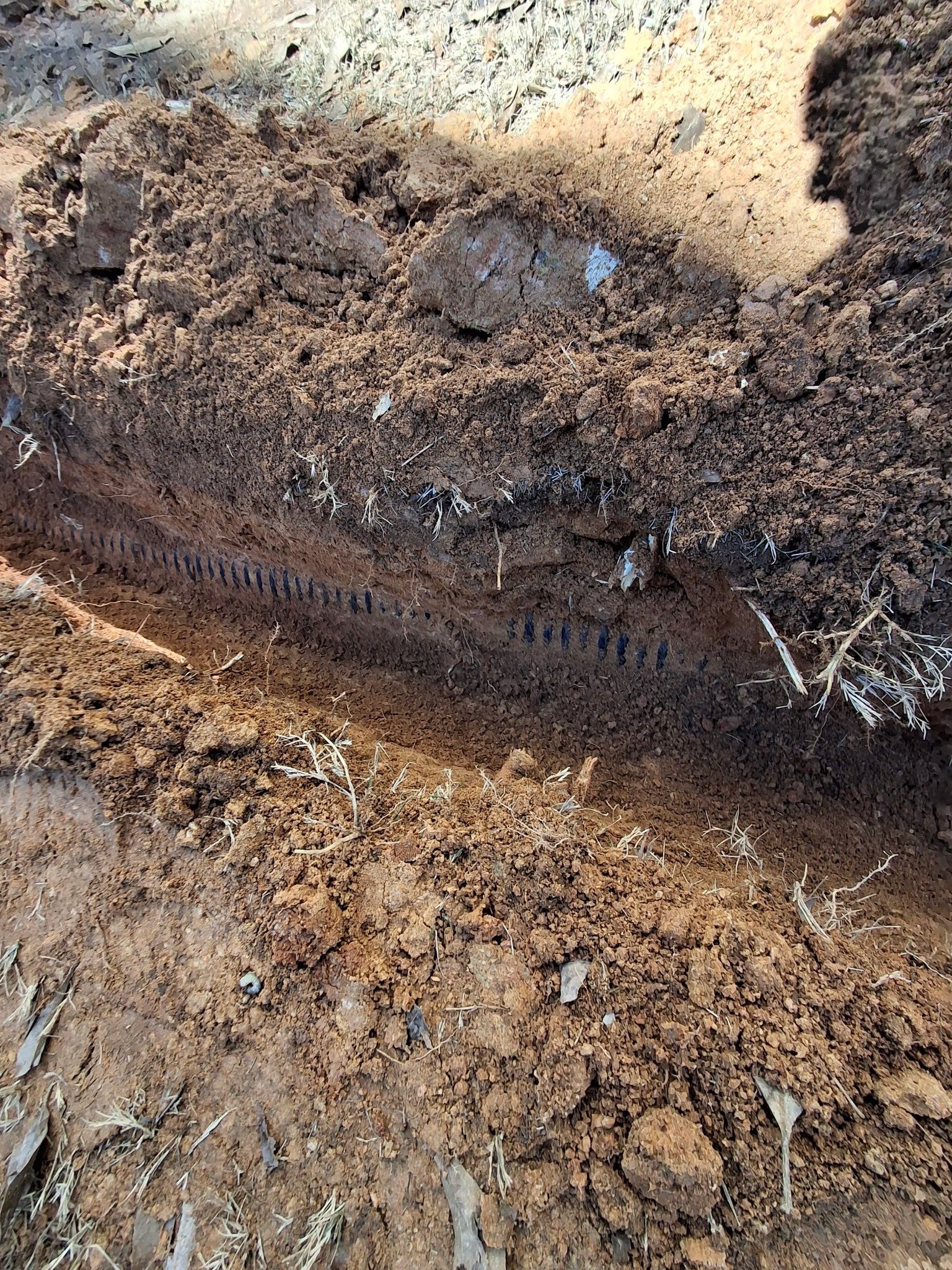 A close up of a pile of dirt on the ground.